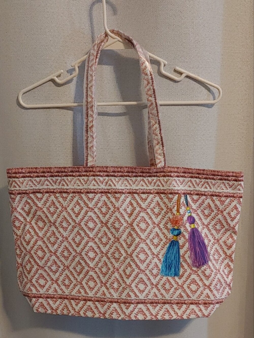 Estee Lauder Pink Patterned Tote Bag with Colorful Tassel Art